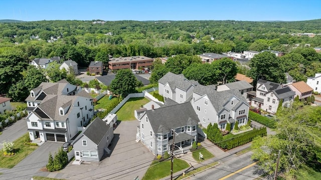 381 Hunnewell St Unit 381, Needham, MA 02494 - aerial perspective of suburban area with a heavily wooded area