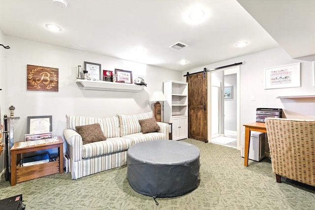 living room with recessed lighting, a barn door, carpet, and visible vents