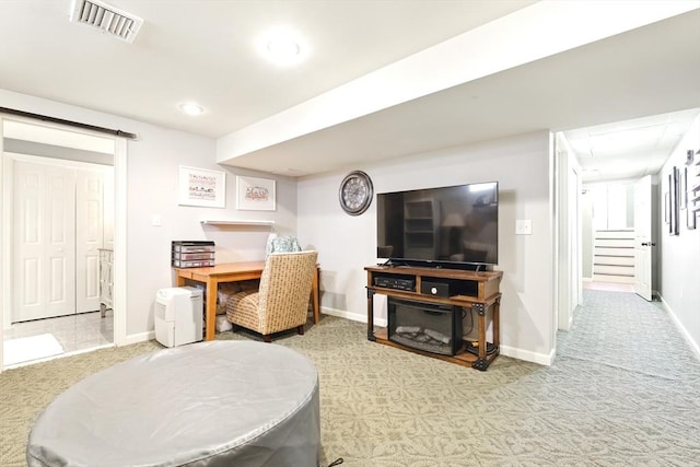 carpeted living room featuring baseboards, visible vents, recessed lighting, stairs, and a barn door