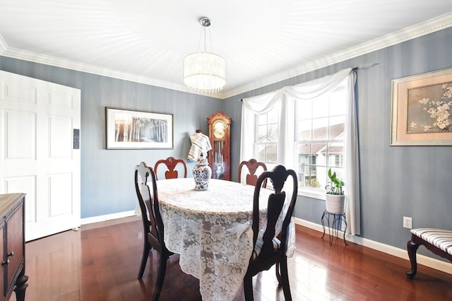 dining space with baseboards, ornamental molding, and dark wood-style flooring