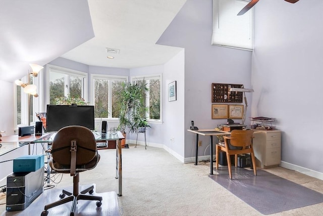 carpeted office with baseboards and visible vents