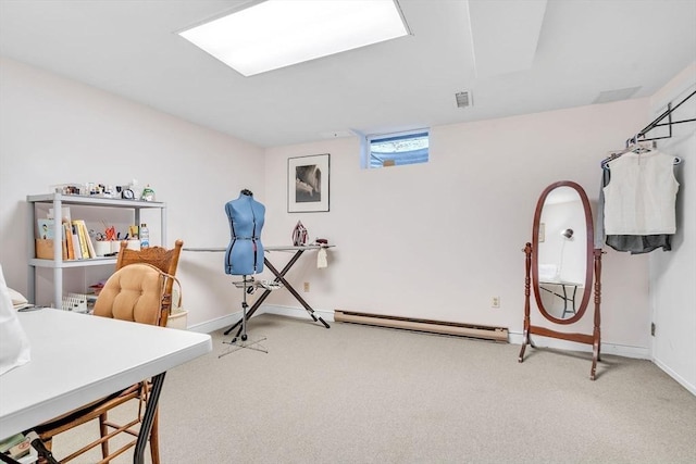 carpeted home office featuring visible vents, baseboards, and baseboard heating