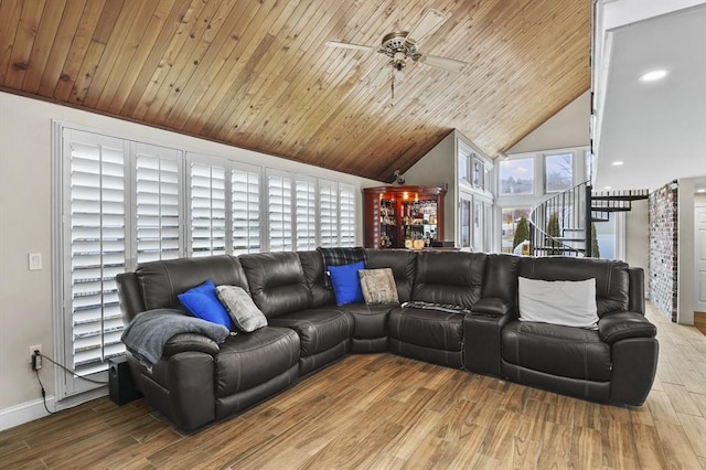 living room featuring a ceiling fan, wood finished floors, wooden ceiling, baseboards, and vaulted ceiling