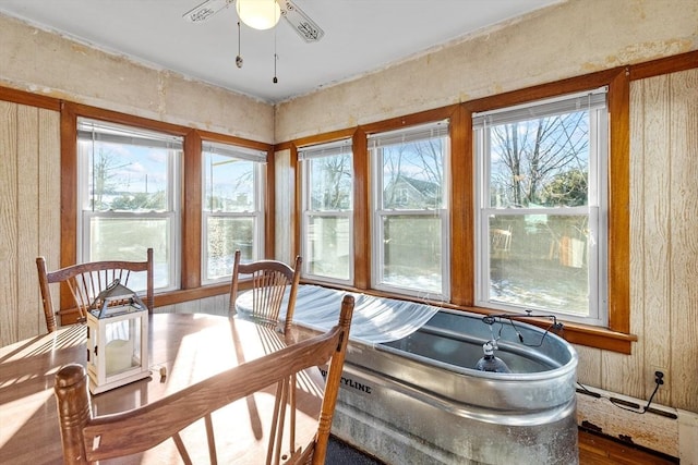 sunroom featuring a healthy amount of sunlight