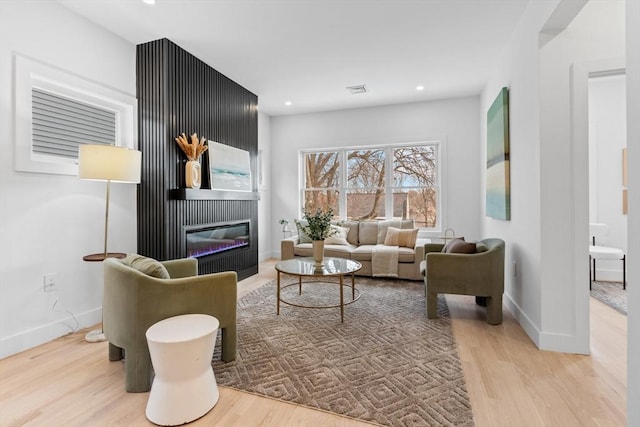 living area featuring light hardwood / wood-style flooring