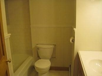 786 Cabot St, Beverly, MA 01915 - full bathroom with vanity and shower / washtub combination