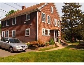 786 Cabot St, Beverly, MA 01915 - view of home's exterior with a chimney, entry steps, and a yard