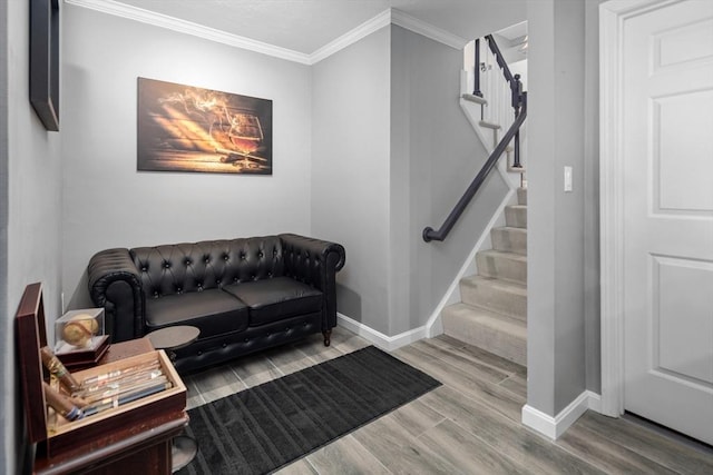 living room with ornamental molding and hardwood / wood-style floors