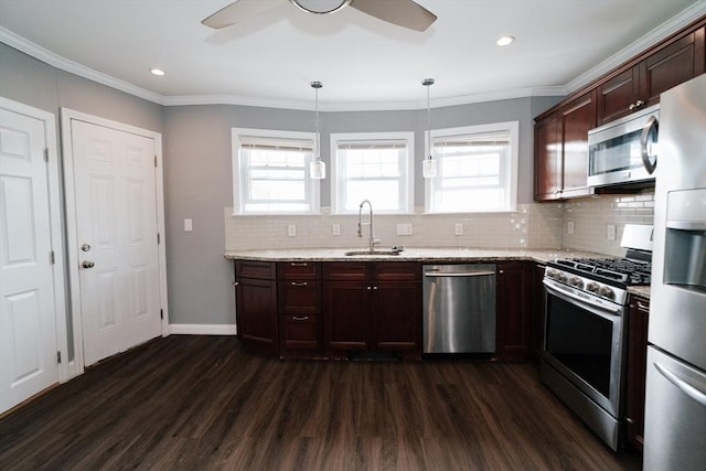 27 Morgan St, Fairhaven, MA 02719 - kitchen with stainless steel appliances, dark wood-type flooring, tasteful backsplash, ceiling fan, and crown molding