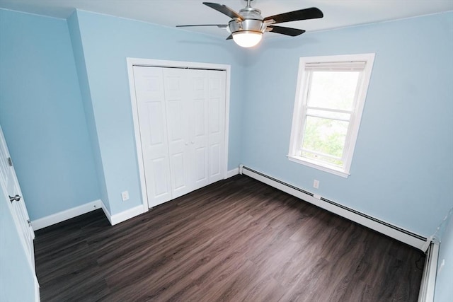 27 Morgan St, Fairhaven, MA 02719 - unfurnished bedroom featuring a baseboard heating unit, dark wood-style floors, a closet, and a ceiling fan
