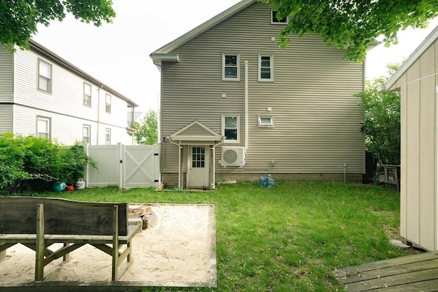 27 Morgan St, Fairhaven, MA 02719 - back of property featuring a gate and a patio area