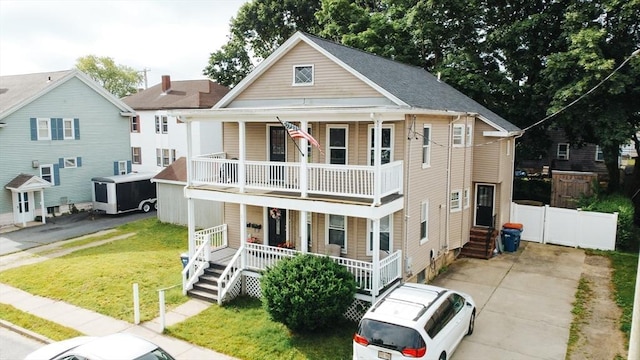27 Morgan St, Fairhaven, MA 02719 - view of front of home featuring covered porch and a balcony