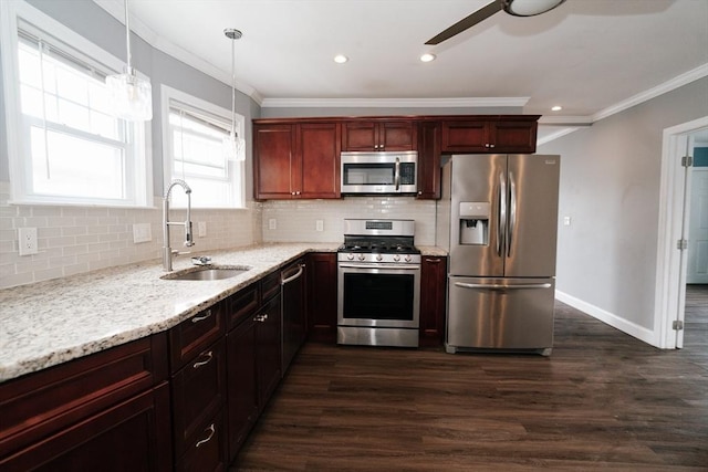 27 Morgan St, Fairhaven, MA 02719 - kitchen with appliances with stainless steel finishes, backsplash, ceiling fan, dark wood-style flooring, and ornamental molding