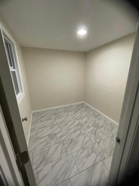 160 7th St, Leominster, MA 01453 - empty room with marble look tile flooring and recessed lighting