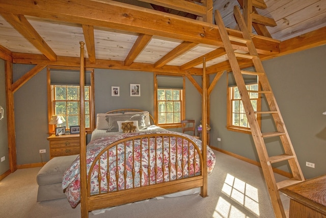 carpeted bedroom featuring wooden ceiling and beam ceiling