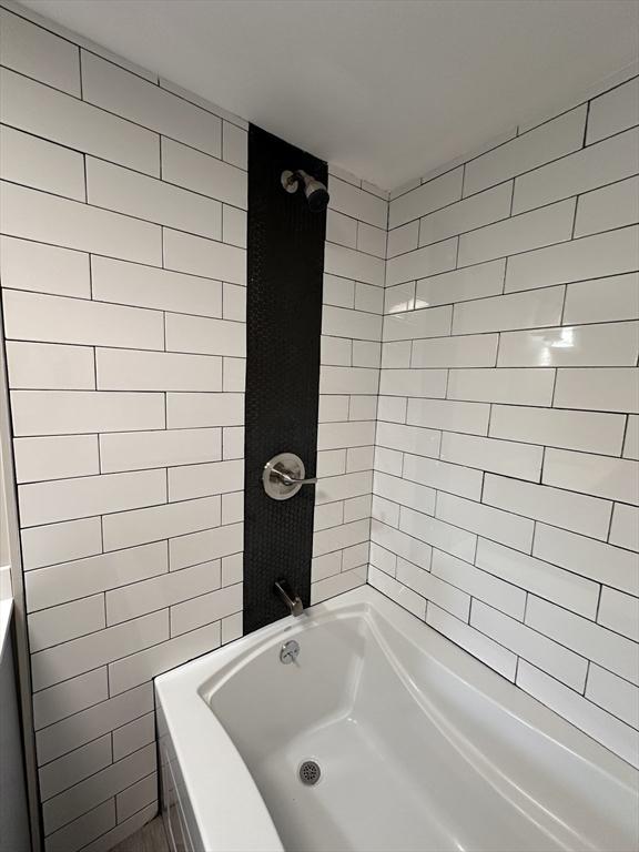 250 Gresham St, Springfield, MA 01119 - full bath featuring  shower combination and tile walls