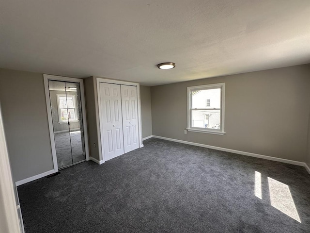 250 Gresham St, Springfield, MA 01119 - unfurnished bedroom with dark carpet and baseboards