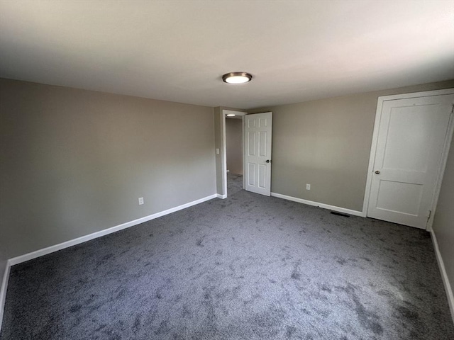 250 Gresham St, Springfield, MA 01119 - unfurnished bedroom with dark carpet and baseboards