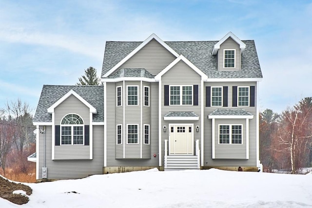 view of front of house featuring a shingled roof