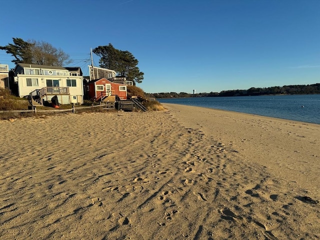 view of water feature with a beach view