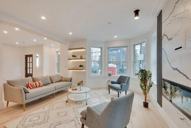 interior space with light wood-style floors, recessed lighting, and baseboards