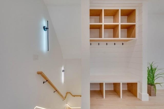 mudroom with wood finished floors