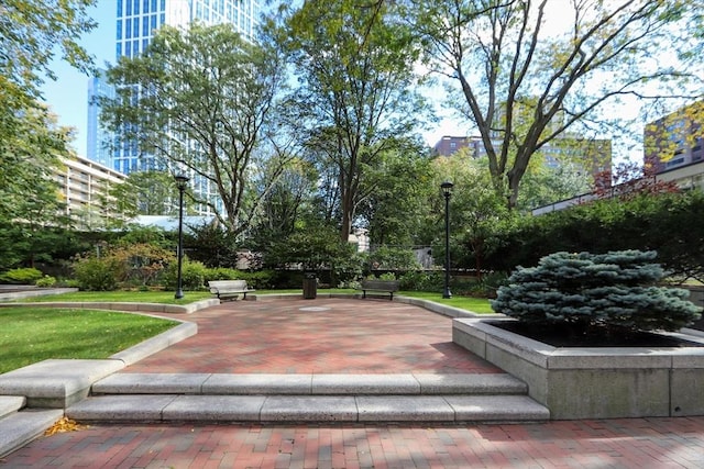 view of home's community featuring a lawn