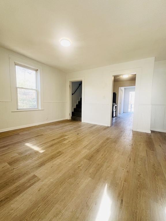 empty room featuring hardwood / wood-style flooring