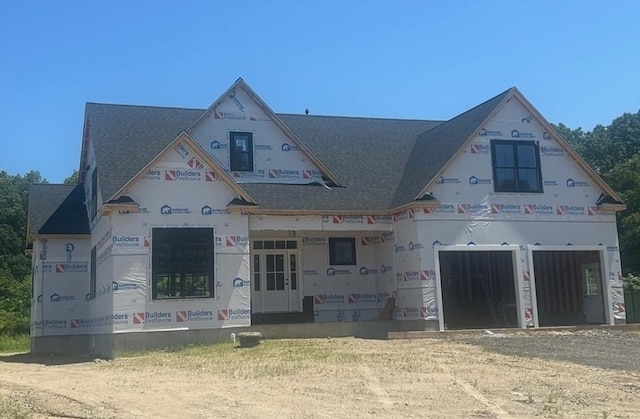 LOT6 Colts Way, Attleboro, MA 02703 - unfinished property featuring dirt driveway, an attached garage, and a shingled roof