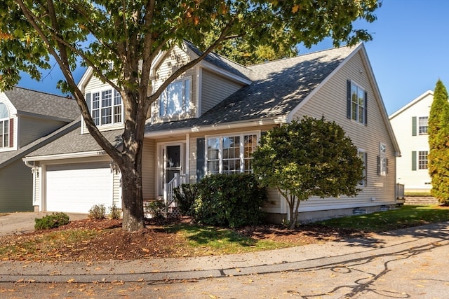 view of front of home with a garage