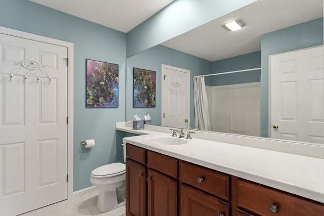 bathroom featuring tile patterned floors, a shower with shower curtain, vanity, and toilet