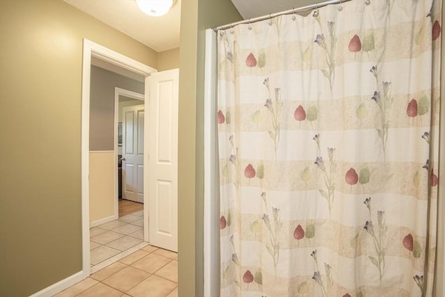 619 Pond St, Weymouth, MA 02190 - full bath with tile patterned floors and curtained shower