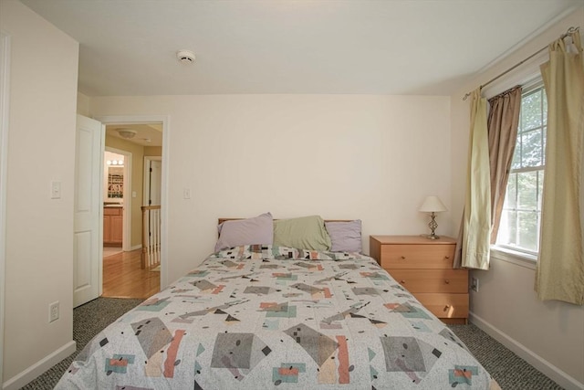 619 Pond St, Weymouth, MA 02190 - bedroom featuring multiple windows, baseboards, and carpet flooring