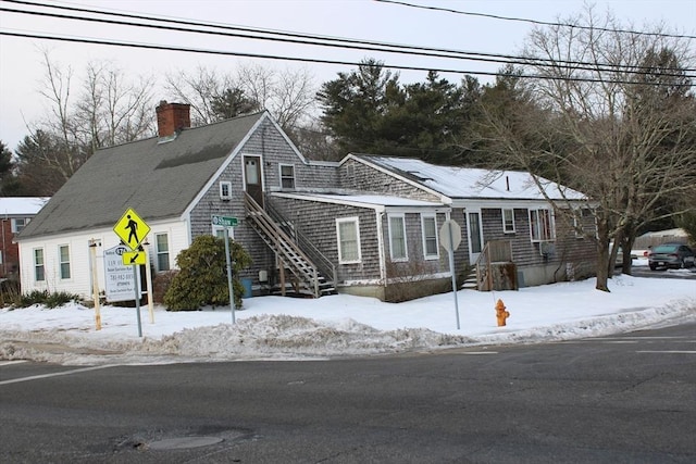 676 Bedford St, Abington, MA 02351 - view of front of house with a chimney