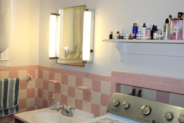 676 Bedford St, Abington, MA 02351 - bathroom with tile walls and a sink