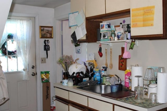 676 Bedford St, Abington, MA 02351 - kitchen with a sink, open shelves, white cabinets, and light countertops