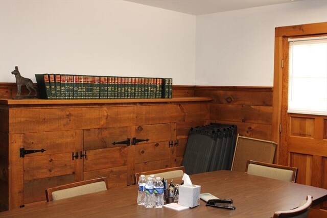 676 Bedford St, Abington, MA 02351 - dining room featuring wooden walls and wainscoting