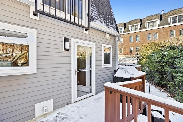 view of snow covered deck