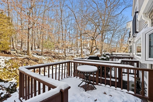 view of snow covered deck