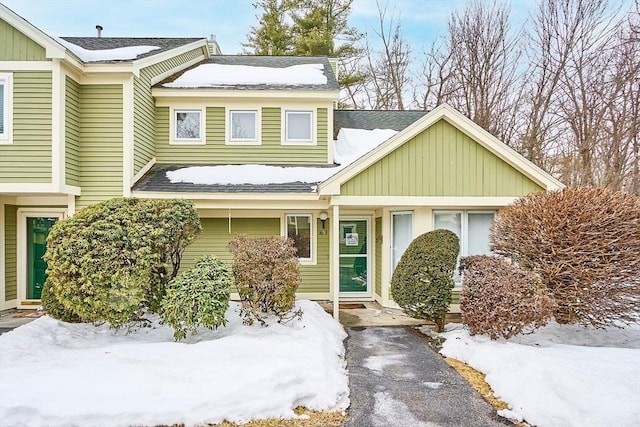 view of front of property with a shingled roof