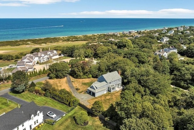 birds eye view of property with a residential view and a water view