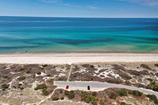 drone / aerial view with a view of the beach and a water view