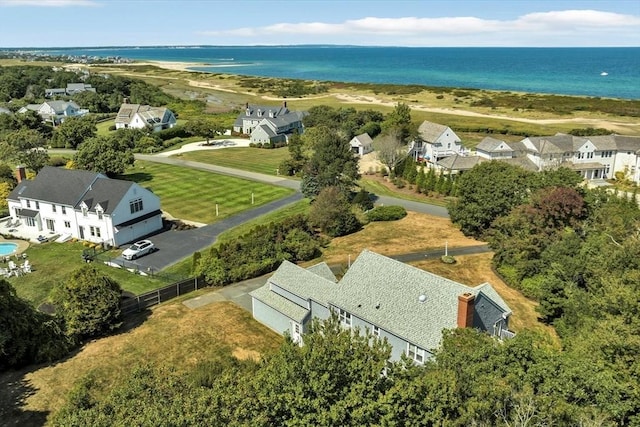 aerial view featuring a residential view and a water view