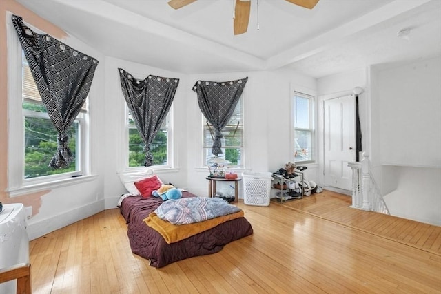 45-47 Crescent St, Swampscott, MA 01907 - bedroom with multiple windows, hardwood / wood-style flooring, a ceiling fan, and baseboards