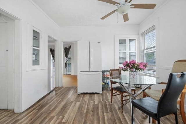 45-47 Crescent St, Swampscott, MA 01907 - dining area featuring wood finished floors, crown molding, and ceiling fan