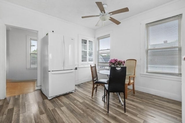 45-47 Crescent St, Swampscott, MA 01907 - dining room featuring wood finished floors, a ceiling fan, ornamental molding, and baseboards