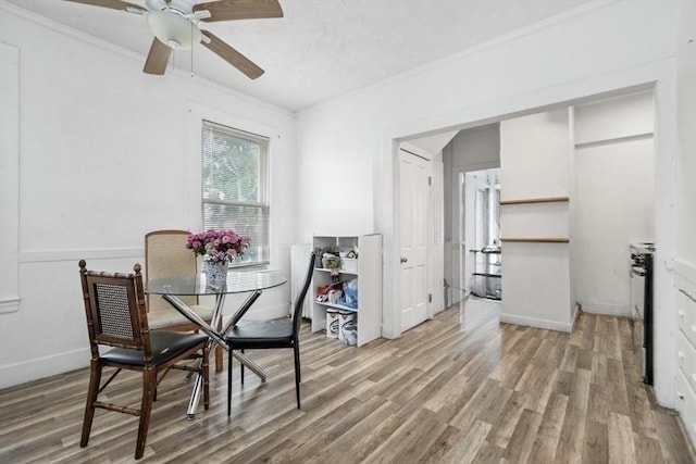 45-47 Crescent St, Swampscott, MA 01907 - dining area featuring ornamental molding, light wood-style flooring, a ceiling fan, and baseboards