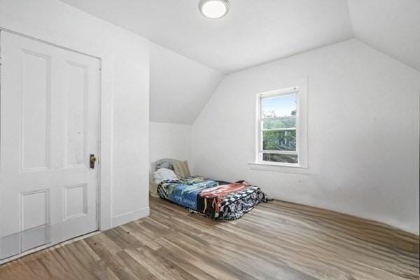 45-47 Crescent St, Swampscott, MA 01907 - bedroom featuring lofted ceiling and wood finished floors