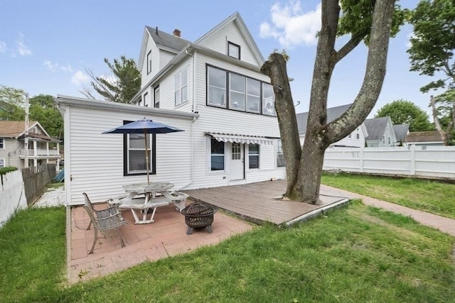 45-47 Crescent St, Swampscott, MA 01907 - rear view of property with an outdoor fire pit, a wooden deck, and a patio area