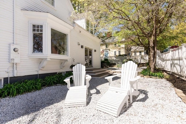 view of patio / terrace featuring fence